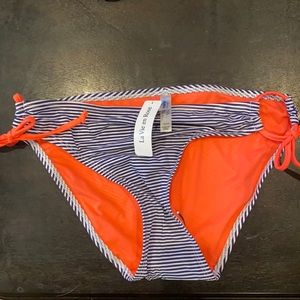 Medium neon and navy swim bottoms never worn